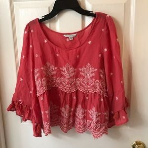 Red and white eyelet blouse